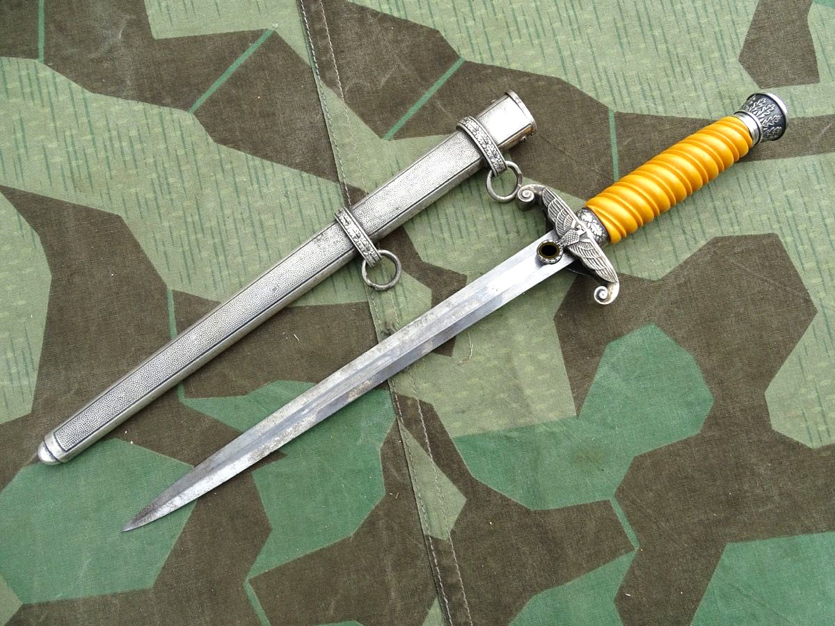 Heeres Offiziersdolch "WMW Waffen " mit rotgelbem Griff, relativ seltener Hersteller