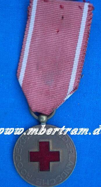 Niederlande: Medaille f. 10 Jahre Dienst i. roten Kreuz, Band
