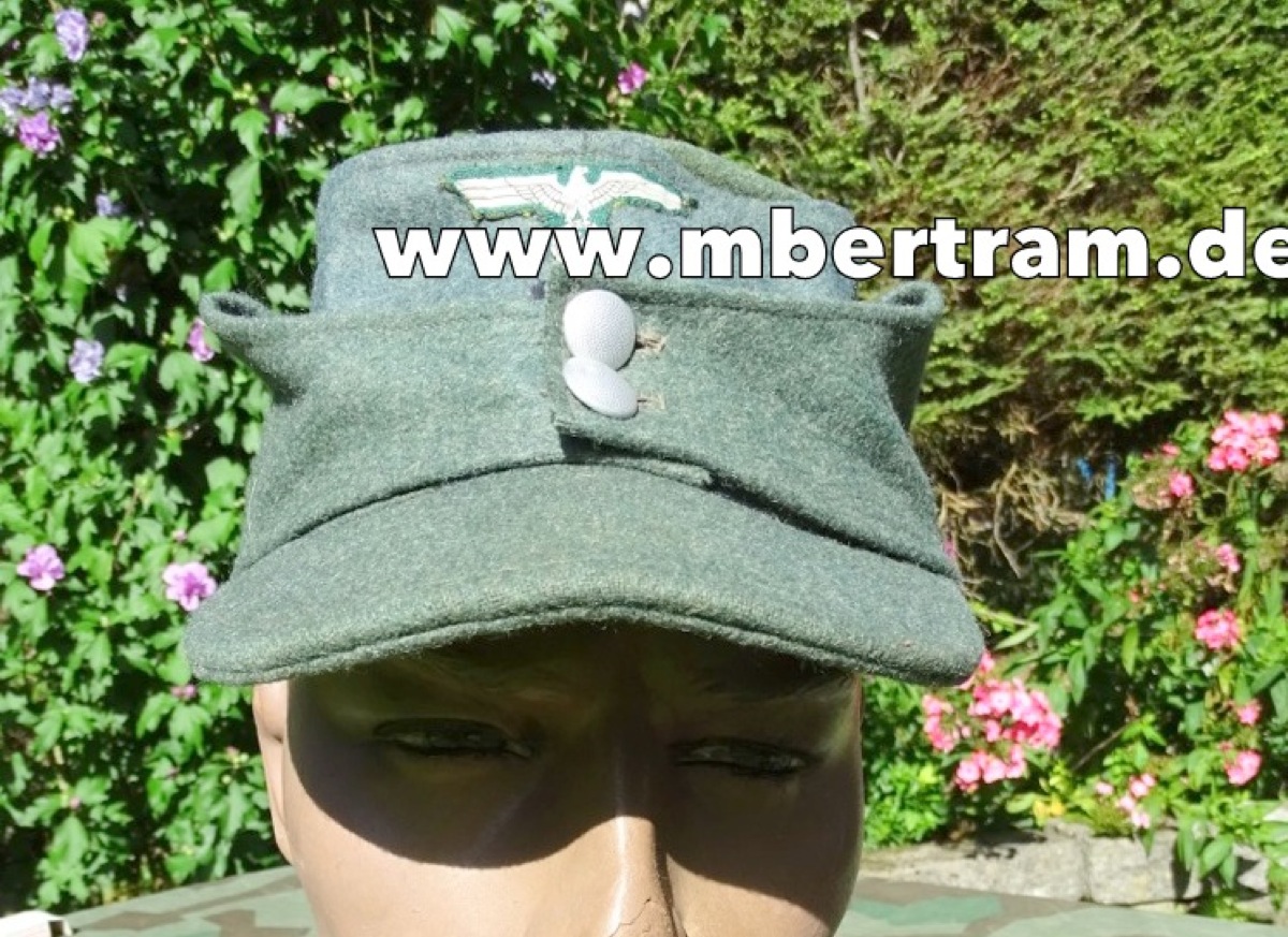 Replik: Wehrmacht/ Geb. Jäger Feldmütze, feldgrau, gewebter Adler, Kokarde, Gr. 58