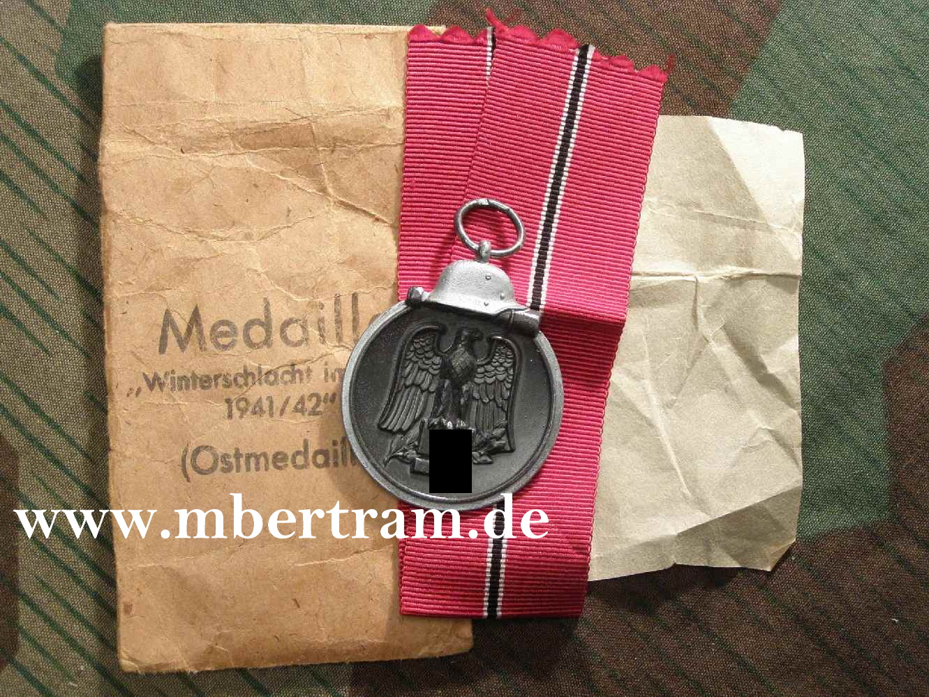 Ostmedaille 1941/42 m. Verleihungstüte, Hst : 93 - Simm