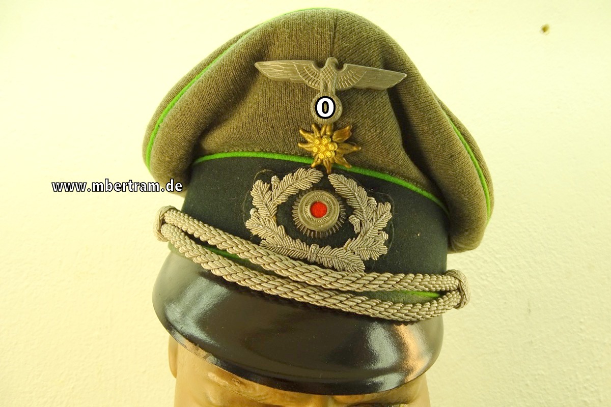 WH Heer: Schirmmütze für einen Offizier der Gebirgsjäger mit Edelweiß u. Hersteller