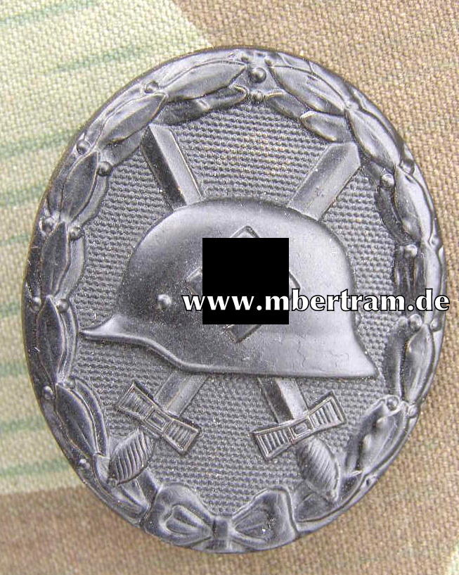 Verwundeten Abzeichen in Schwarz, Buntmetall.