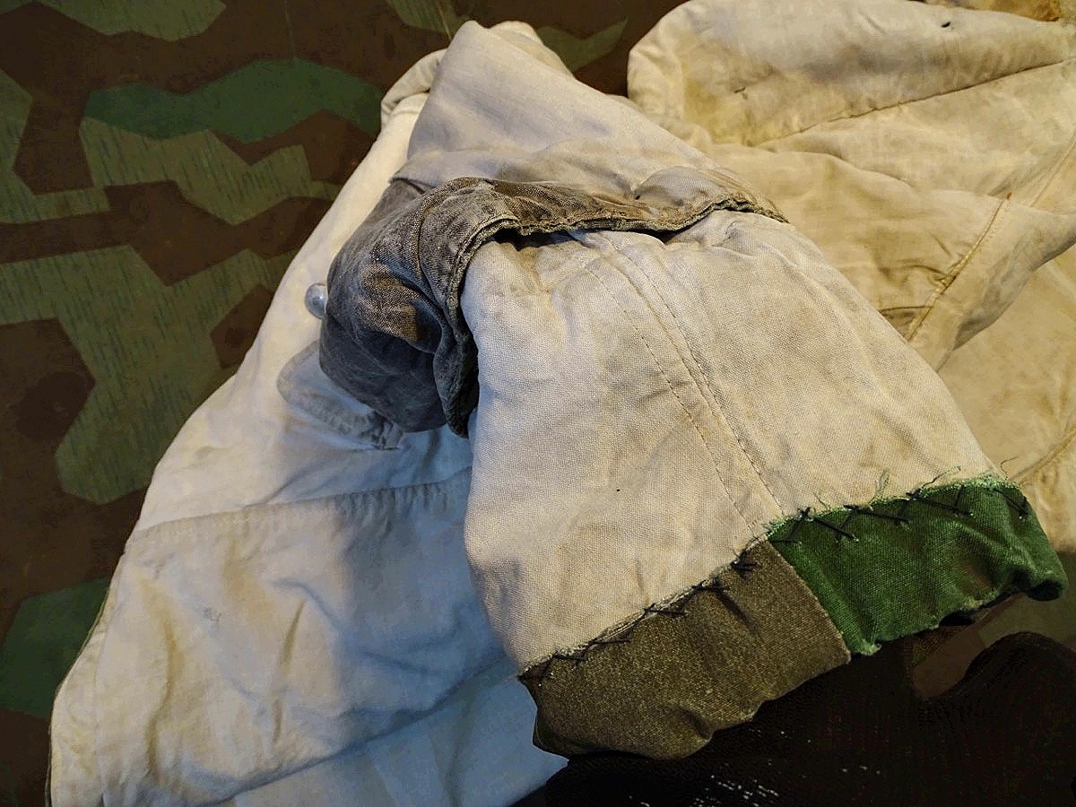 20950-27 Wehrmacht wendbare Wintertarnjacke, Splittertarn auf weiß, getragenes, ungereinigtes Stück