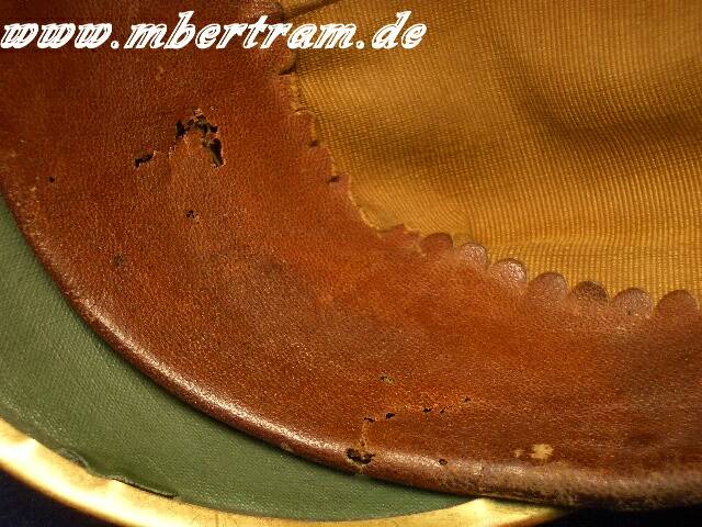 876-12 Preussische Offizierspickelhaube , Leder.