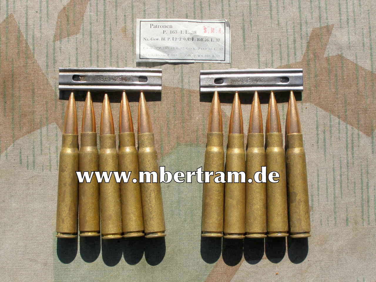 10 Deko Patronen, 2 Ladestreifen."P163, 1937" Messing