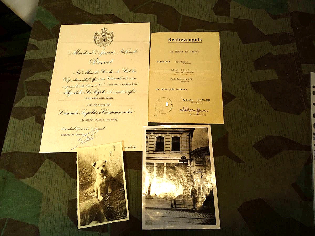 Schmuckurkunde Kreuzzug gegen den Kommunismus 1941 und Urkunde Krimschild, 2 Fotos.