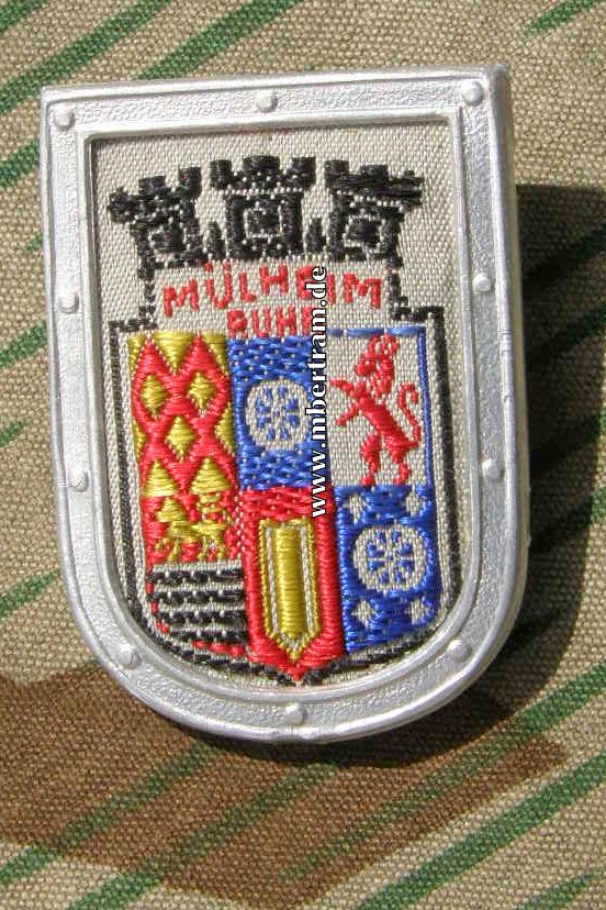 WHW, "Mühlheim Ruhr" Webabzeichen mit Blechrahmen