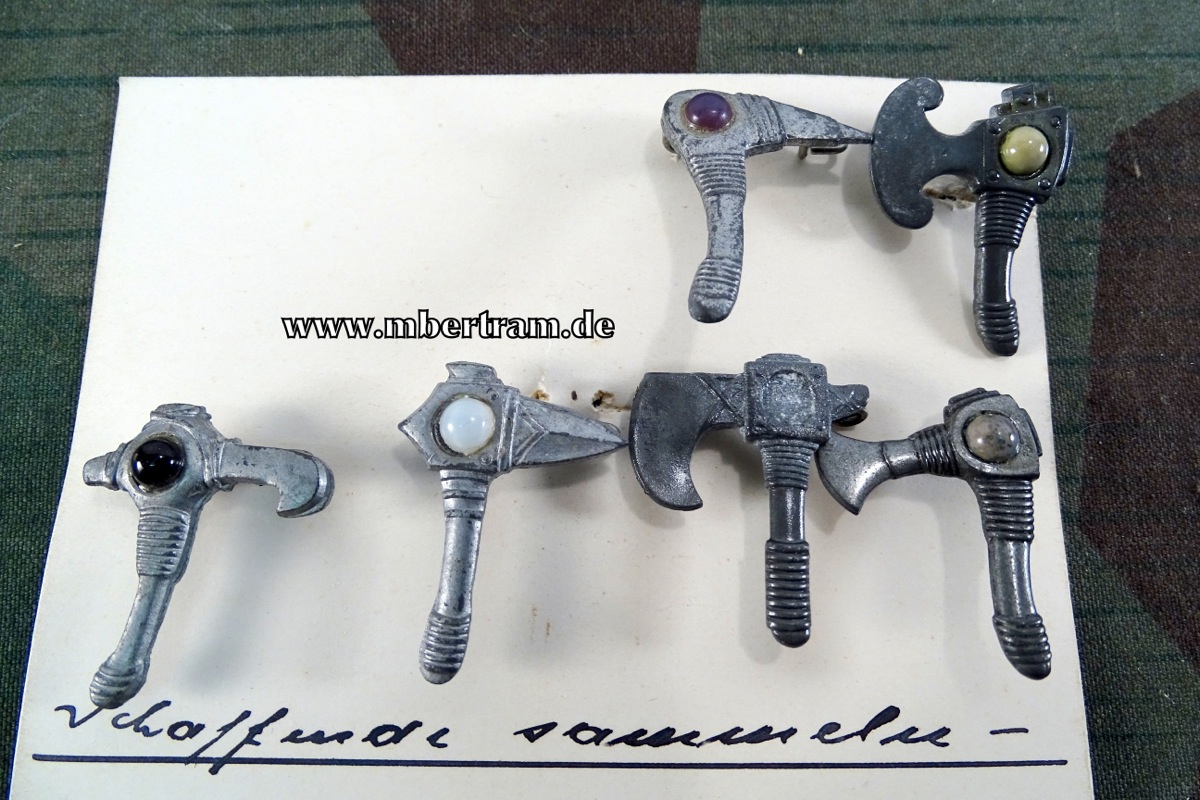 WHW - 1940. 6 versch. Metallabzeichen "Altgermanische Kampfbeile und Streitäxte