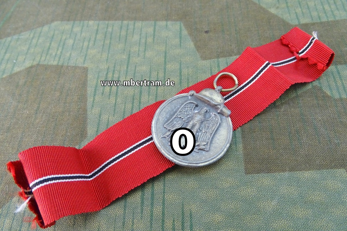 Medaille Winterschlacht im Osten,  Feinzink, am Band, Hersteller 110