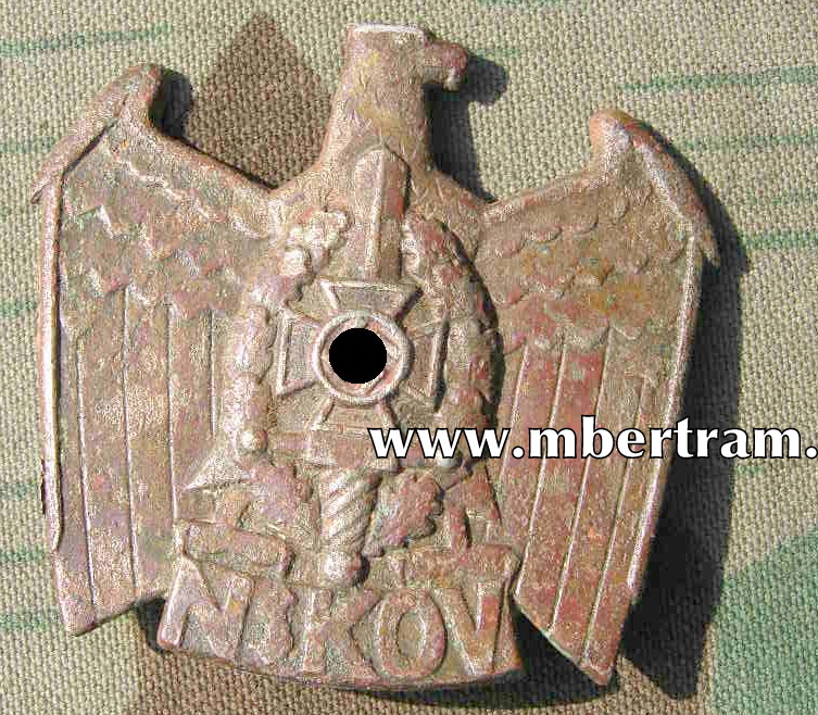 NSKOV Mützenabzeichen, Buntmetall, getragenes Original