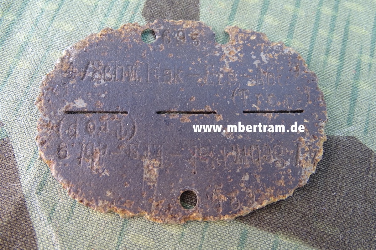 Wehrmacht Erkennungsmarke: " 4. schw. Flak ( Ers. ) Abt. 9 ( Trop)  Feinzink