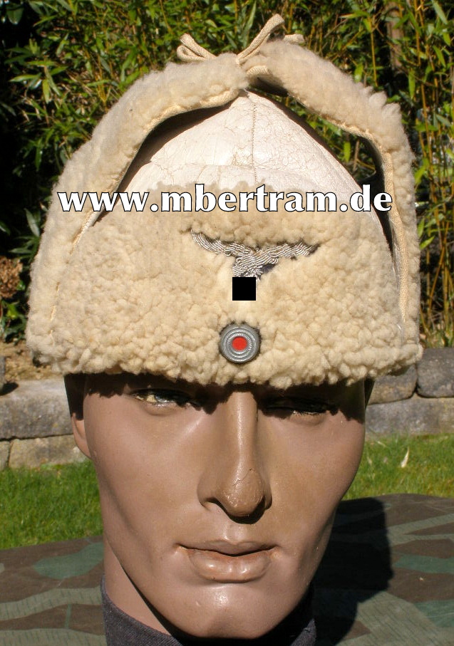 Luftwaffe Offiziers/ Unteroffiziers Winterfellmütze um 1943.