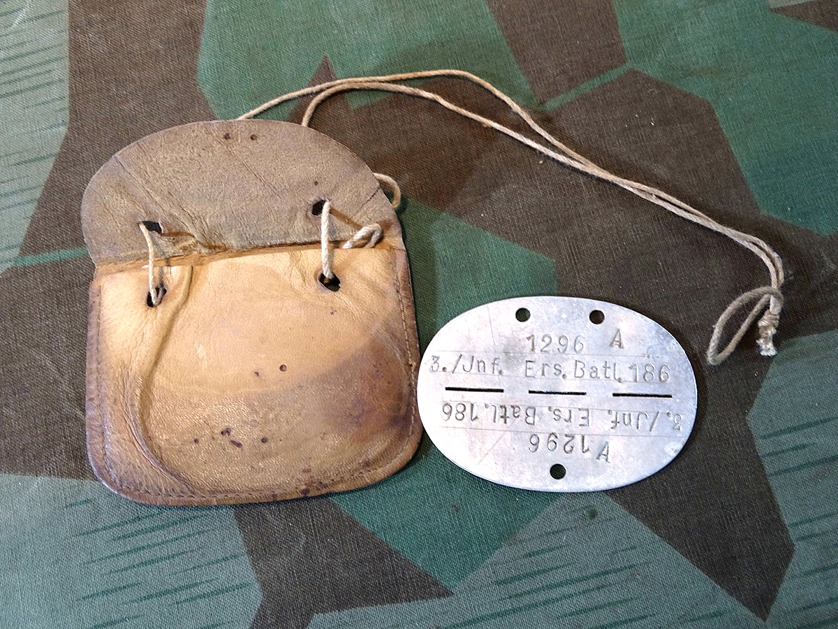 Erkennungsmarke der Wehrmacht, 3. Inf. Ers. Btl. 186, Aluminium,  mit Tragebeutel