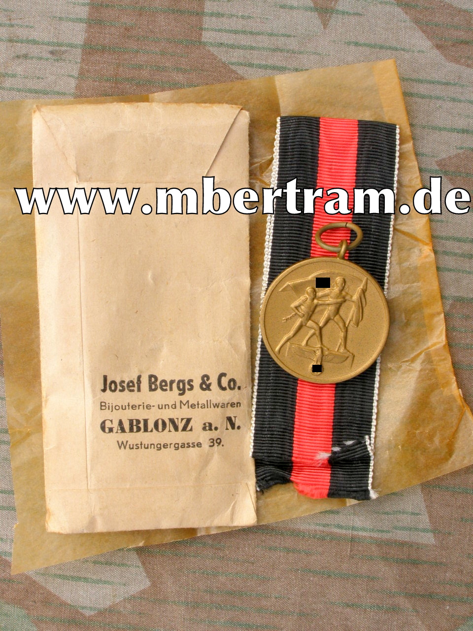 Medaille zur Erinnerung an den 1.Oktober 1938, mit Tüte