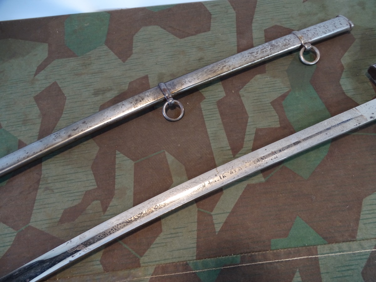 Früher (Ulanen ?) oder Artillerie Säbel, 2 Scheidenringe. Mit Ätzung 1891-94 Früher (Ulanen ?) oder Artillerie Säbel, 2 Scheidenringe. Mit Ätzung 1891-94