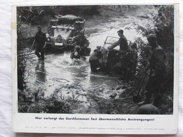 Vormarsch dt. SS Fahrzeuge in schlammigem Gebiet, 1941