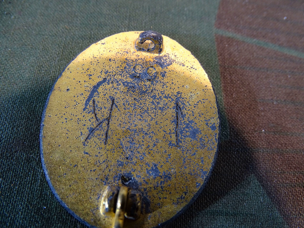 Verwundeten Abzeichen in Gold 1939, Hst. 65, (Klein& Quenzer AG, Idar Oberstein), entnazifiziert. 