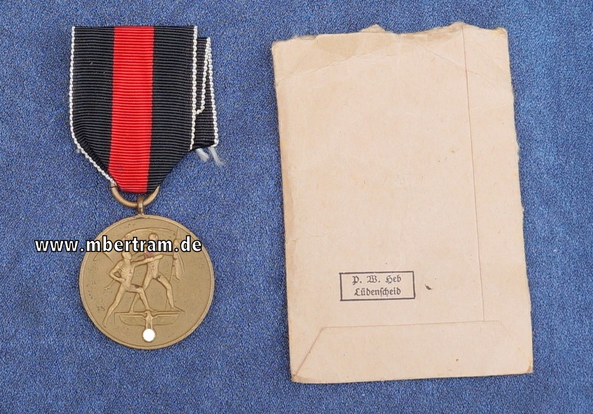 Erinnerungsmedaille zum 1. Oktober 1938 am Band mit Verleihungstüte