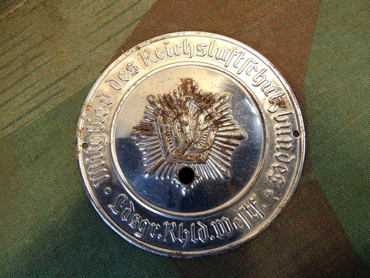 Tür Plakette. RLB:  Mitglied des Reichs Luftschutz Bundes, Ldgr. Rhld. Westf. 