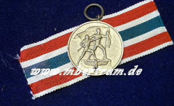 Memellandmedaillie mit Band. 22. 03. 1939