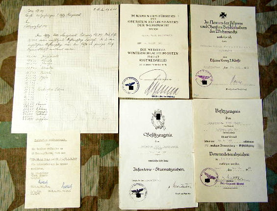 Urkunden: 12.Inf.Rgt 311, ISA, EK 2, Ostmed.,VWA, NKpfSp.br.