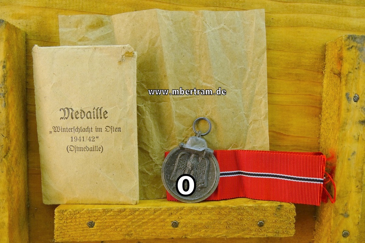 Medaille Winterschlacht im Osten,  Feinzink, am Band, mit Tüte, Karl Wurster