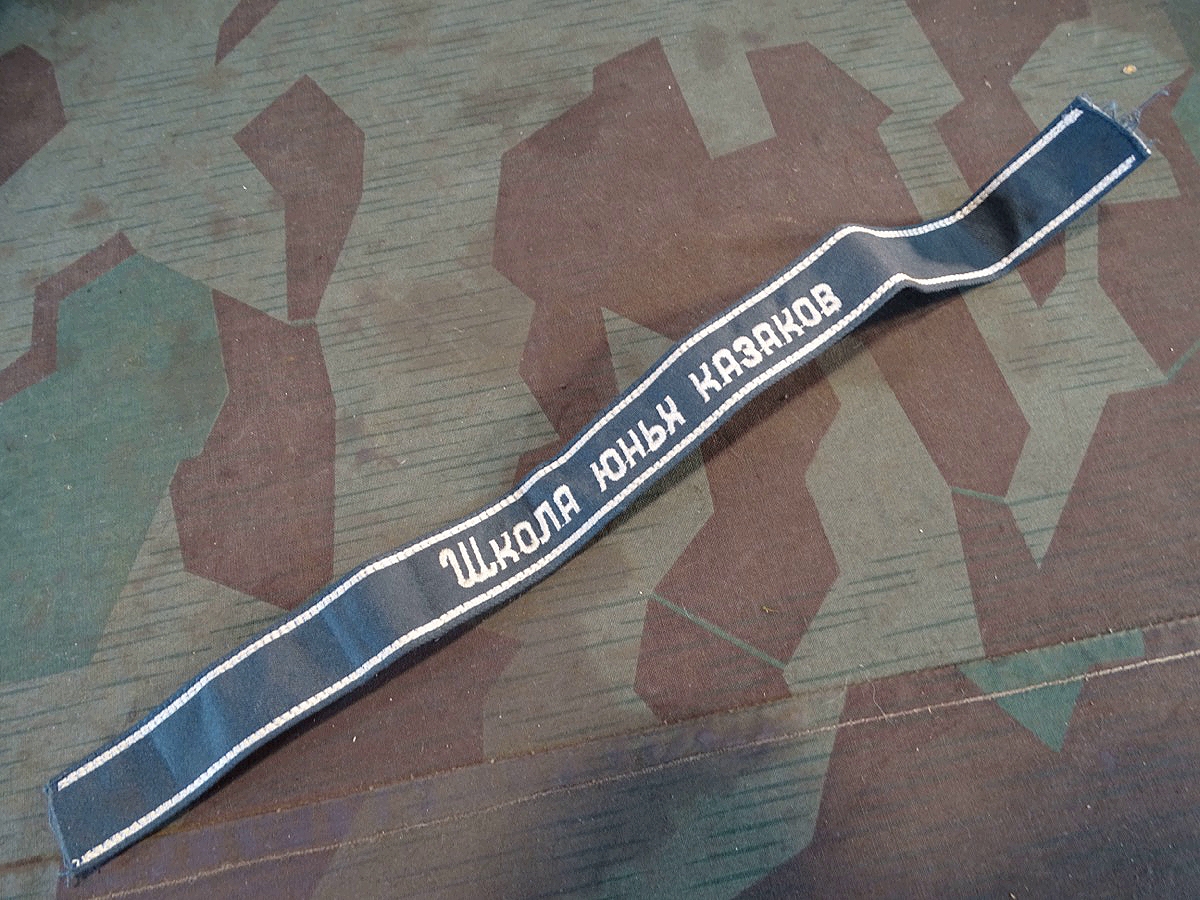 Uns unbekanntes  Ärmelband, Replik Wehrmacht ? wohl mit russischer Schrift ?