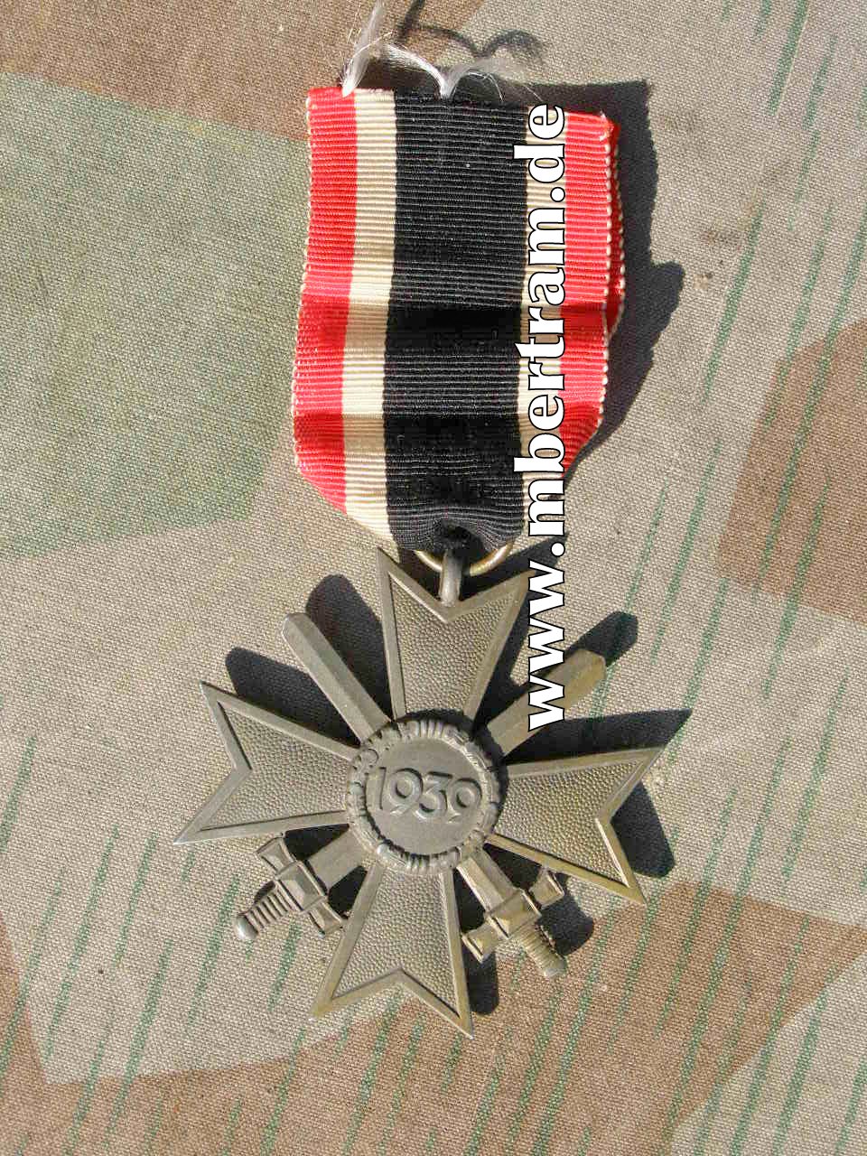 KvK 2 Kl. 1939 m. Schw., mit Band. Feinzink. Mit Hst. 64