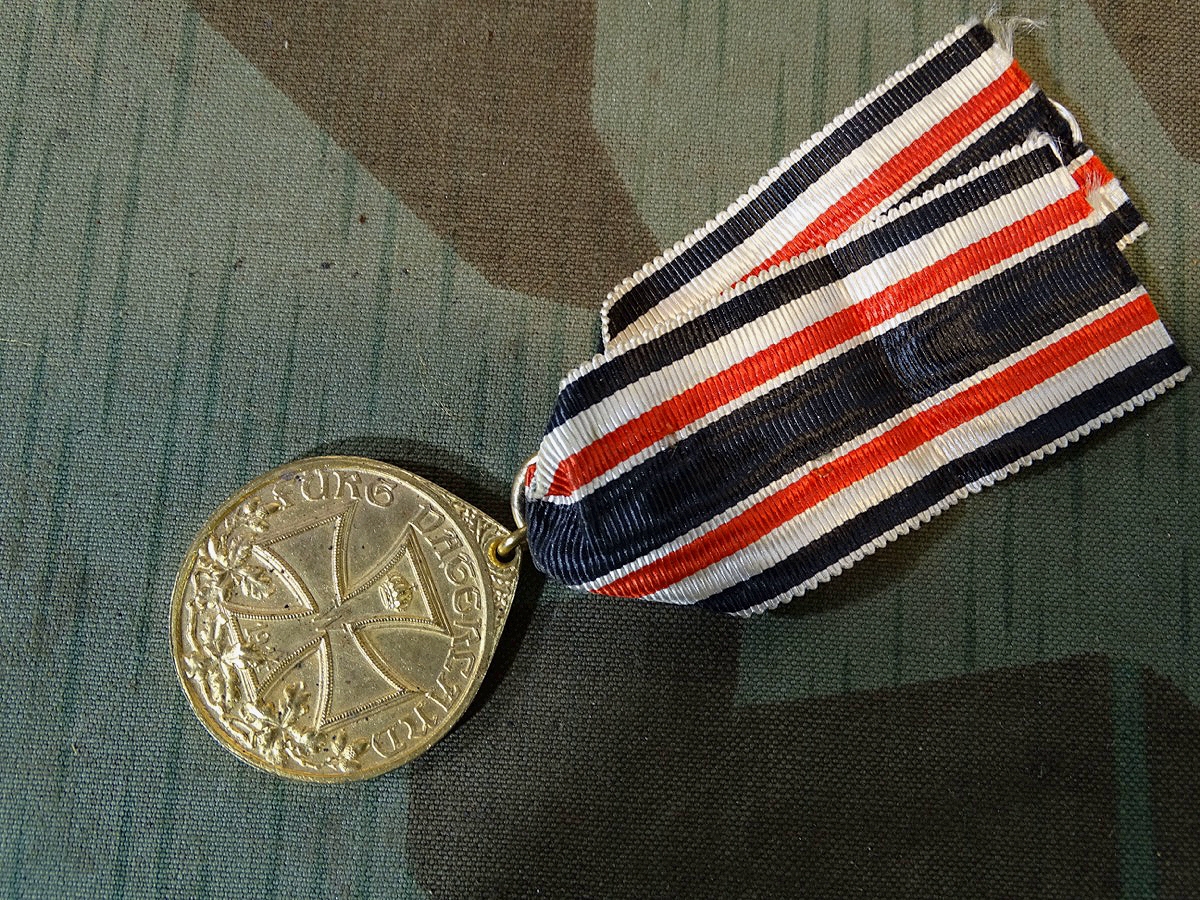 Deutsche Ehrendenkmünze des Weltkrieges, "Fürs Vaterland", Buntmetall mit Band